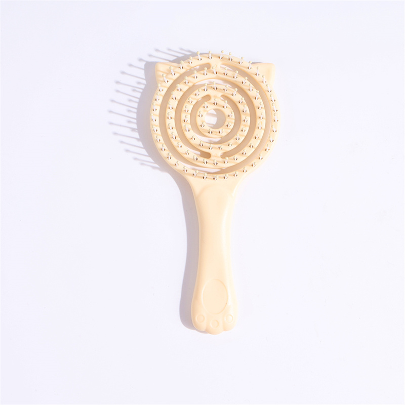 Lattice-shaped hairbrush in pink and yellow colors
