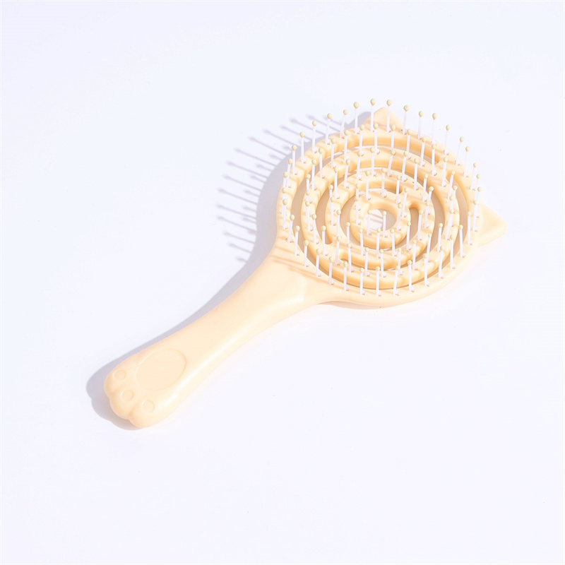 Lattice-shaped hairbrush in pink and yellow colors
